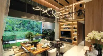  ??  ?? Living room of a four-bedroom premium unit with double-volume ceiling height