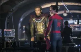  ?? JAY MAIDMENT — COLUMBIA PICTURES — SONY VIA AP ?? This image released by Sony Pictures shows Jake Gyllenhaal, left, and Tom Holland in a scene from “Spider-Man: Far From Home.”