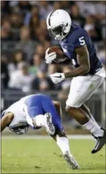  ?? CHRIS KNIGHT — THE ASSOCIATED PRESS ?? Penn State’s DaeSean Hamilton (5) avoids a hit by Georgia State’s Cedric Stone, left, after a catch during the first half Saturday.