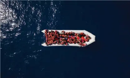  ?? Photograph: Felipe Dana/AP ?? The AP originally planned to offer the photo of an overcrowde­d rubber boat north of the Libyan coast as an NFT, before calling the image a ‘poor choice’.