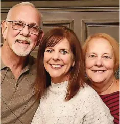  ??  ?? Joe and Donna Cougill with their daughter, Laura Mabry, who reunited them after 50 years apart.