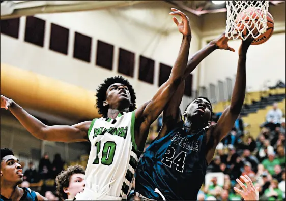  ?? KYLE TELECHAN / POST-TRIBUNE PHOTOS ?? Valparaso’s Brandon Newman, left, who averaged 24.9 points last season, is skipping his senior year in high school and will enroll at Montverde.