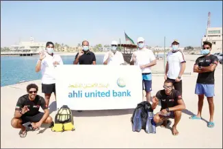  ??  ?? A group of volunteers from the Bank’s staff who enjoy diving during the initiative.