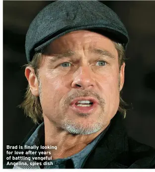  ?? ?? Brad is finally looking for love after years of battling vengeful Angelina, spies dish