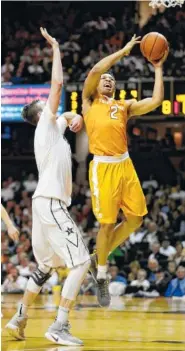  ?? ASSOCIATED PRESS FILE PHOTO ?? Tennessee forward Grant Williams drives past Vanderbilt forward Luke Kornet during their game this past January in Nashville. Williams hopes the Vols’ depth brings more success this season, which is set to tip off next month.
