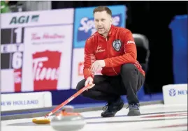  ?? The Canadian Press ?? Team Canada skip Brad Gushue delivers a shot during Canada’s match against P.E.I. the 2023 Tim Hortons Brier at Budweiser Gardens in London, Ont. on Monday.