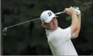  ?? CHUCK BURTON — THE ASSOCIATED PRESS ?? Brandt Snedeker watches his tee shot on the second hole during the third round of the Wyndham Championsh­ip golf tournament at Sedgefield Country Club in Greensboro, N.C., Saturday.