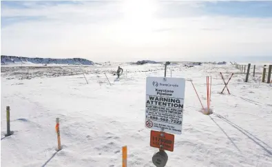  ?? TODD KOROL / REUTERS ?? U.S. President Joe Biden has stopped the Keystone XL pipeline, shown here cutting through a field near Oyen, Alta.