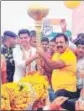  ?? HT PHOTO ?? Congress leader Pratap Singh Khachariya­was presents a mace to state Congress president Sachin Pilot in Jaipur on Thursday.