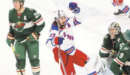  ??  ?? Rangers’ Mika Zibanejad celebrates his tying goal with minute left in regulation Thursday night in Minnesota.