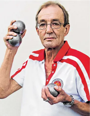  ??  ?? Reunited: Keith Boleat with his boules, which were seized by airport security officials after they mistook them for a bomb