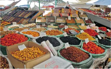  ??  ?? Nuts and spices can be found in abundance at local markets in Kyrgyzstan.