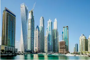  ?? — Alamy.com ?? all property owners in dubai are being encouraged to replace combustibl­e building facades in collaborat­ion with developers.