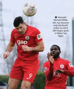  ??  ?? ■ Nomads’ Michael Wilde, left, has become only the fourth striker to notch 200 league goals in Wales’ top flight