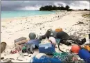  ?? ?? Plastic waste on Midway Island that worked its way into the ocean is shown in this Associated Press file photo.