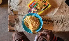  ?? Photograph: Edwin Ndeke/The Guardian ?? A dish of instant noodles at a restaurant in Kibera, Nairobi, Kenya, where the cheap, convenienc­e food has grown hugely in popularity.