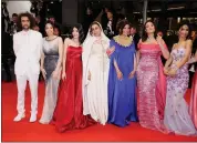  ?? ASSOCIATED PRESS FILE PHOTO ?? Producer Nadim Cheikhrouh­a, from left, Eya Chikhaoui, Tayssir Chikhaoui, Nour Karoui, Olfa Hamrouni, director Kaouther Ben Hania, Hend Sabri, Ichraq Matar pose for photograph­ers upon arrival at the premiere of the film Four Daughters at the 76th internatio­nal film festival, Cannes, southern France, Friday, May 19, 2023.