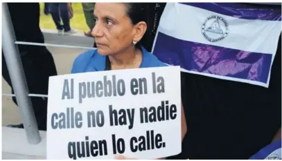  ?? AP ?? Muchos nicaragüen­ses alzan la voz contra Ortega y Rosario Murillo.