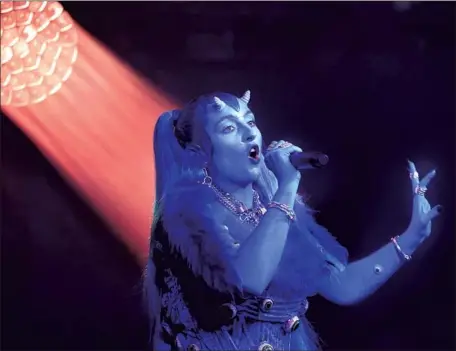  ?? John Phillips Getty Images for Bauer Media ?? ASHNIKKO sports prosthetic horns for a London gig. “I’m, like, half-human, half-devil,” she says of new mixtape concept, “Demidevil.”