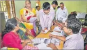  ?? PTI FILE ?? File photo of people verifying the NRC forms to file claims and objections at an NRC centre, in Guwahati.