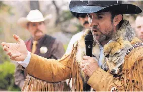  ?? MORGAN LEE/ASSOCIATED PRESS ?? Otero County Commission­er and Cowboys for Trump co-founder Couy Griffin denounces gun control and pro-abortion rights bills in the New Mexico State Legislatur­e at a protest in Santa Fe, N.M. in March 2019.