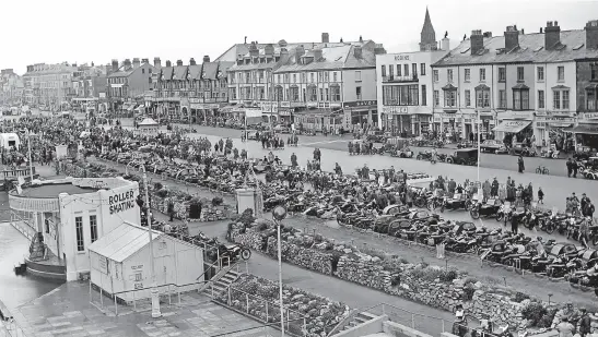  ?? Mortons Archive www.mortonsarc­hive.com. ?? To give some idea of the popularity of motorcycli­ng in the mid-1950s, this stunning photo was taken on the seafront at Rhyl, North Wales, during the 1954 ACU National Rally. There must have been a fair number of 500cc parallel twins among the massed ranks of entrants and followers.