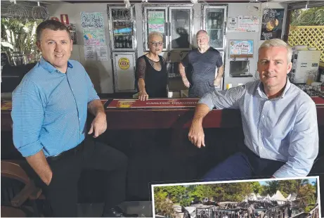  ??  ?? SALE: Victoria Park hotel owners Robyn and Frank Sexton with Knight Frank agents Paul Dury and Mark Fitzgerald. Picture: MATT TAYLOR. RIGHT: The hotel after the fire.