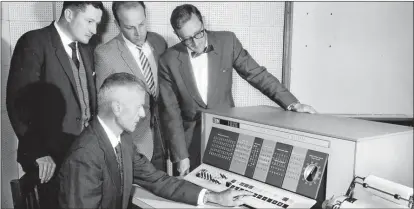  ??  ?? In 1963, Stellenbos­ch University was only the second university after Wits to acquire a computer. Here, a group of SU researcher­s and managers admire the “fantastic tempo” of the IBM-1620 computer Photo: SU Archive