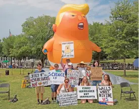  ?? (AFP) ?? This file photo shows the ‘Trump Baby’ blimp when it was set up by the CodePink group members ahead of the ‘Salute to America’ event at the Lincoln Memorial on the National Mall, in Washington, DC, on July 4, 2019