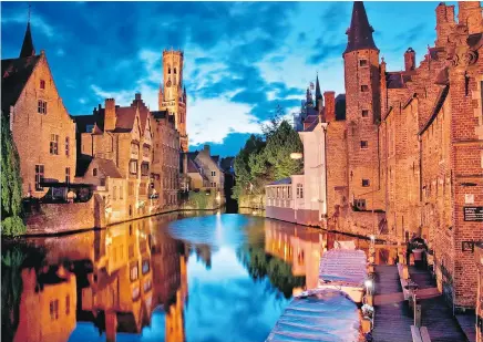  ??  ?? One of the many canals that wind through Bruges in northern Belgium. The city was left largely intact during the two world wars and has been called the Venice of the North because of its beauty.