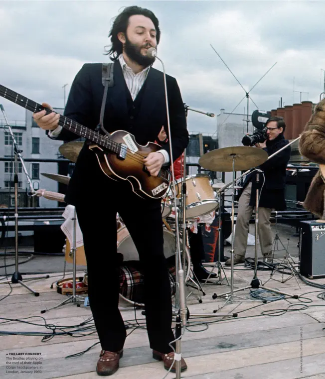  ??  ?? THE LAST CONCERT The Beatles playing on the roof of their Apple Corps headquarte­rs in London, January 1969.