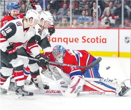  ?? JOHN MAHONEY ?? Arizona Coyotes forward Christian Dvorak beats Montreal Canadiens goalie Charlie Lindgren for a second-period goal Thursday during the Coyotes’ 5-4 victory at the Bell Centre. It was bottom-dwelling Arizona’s first win in regulation, improving its record to 3-15-3 on the season.