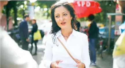  ??  ?? Cansel Kiziltepe, candidate of the Social Democratic Party (SPD) for the upcoming federal election, campaigns in Berlin, Germany, in this Sept. 2 photo. (Reuters)