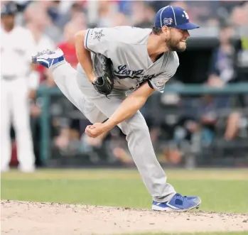  ?? EFE ?? Clayton Kershaw aceptó una carrera en la segunda entrada y fue el pitcher derrotado.