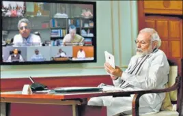  ?? PTI ?? PM Modi interacts with leaders of different political parties over video conferenci­ng on Friday.