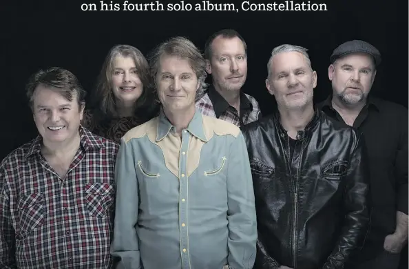  ?? WARNER MUSIC CANADA ?? Jim Cuddy, third from left, and his bandmates Bazil Donovan, left, Anne Lindsay, Joel Anderson, Colin Cripps and Steve O’Connor are set to tour Canada with Cuddy’s emotional new solo album Constellat­ion, which focuses on both the durability and end of...