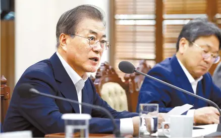  ?? Yonhap ?? President Moon Jae-in speaks in a meeting at Cheong Wa Dae, Monday, after Justice Minister Cho Kuk gave a report on his plans to reform the prosecutio­n. The President said the prosecutio­n — which is investigat­ing corruption scandals involving Cho and his family members — lacks the will to overhaul itself.