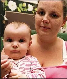  ??  ?? Legal action: Caroline Starmer with her baby Paige