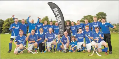  ?? Photo: Neil Paterson ?? The victorious Lochcarron Team pictured with the Strathdear­n Cup afte their 4-1 win over Glenurquha­rt.