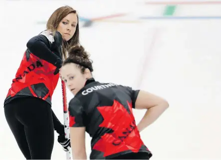  ?? NATACHA PISARENKO/THE ASSOCIATED PRESS ?? Canada’s skip Rachel Homan, left, and Joanne Courtney during the match against Britain on Wednesday.