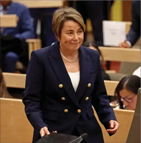  ?? STUART CAHILL — BOSTON HERALD ?? Gov. Maura Healey arrives to testify at her former lover’s hearing yesterday before the Governor’s Council.