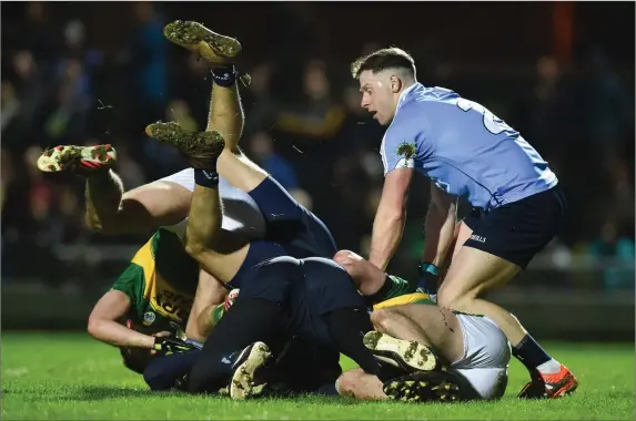  ??  ?? Kerry’s Jack Savage and Paul Geaney tussle off the ball with Michael Fitzsimons, Stephen Cluxton and Philip McMahon of Dublin during Saturday’s Allianz Football League Division 1 Round 5 match at Austin Stack Park, Tralee. Photo by Diarmuid Greene/Sportsfile