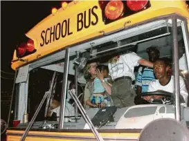  ?? Houston Chronicle file ?? Jabbar Gibson commandeer­ed a bus and drove himself and 80 people he picked up along the road from New Orleans to Houston fleeing from Hurricane Katrina.