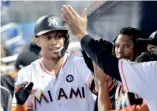  ??  ?? Giancarlo Stanton conectó su vuelacerca 56 de la temporada para los Marlins.