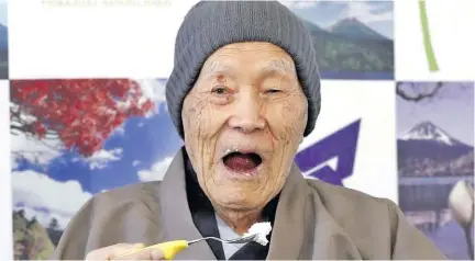  ??  ?? Japanese Masazo Nonaka, who is 112 years old, eats his favourite cake as he receives a Guinness World Records certificat­e naming him the world’s oldest man during a ceremony in Ashoro on Monday.