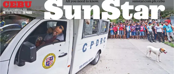  ?? SUNSTAR FOTO / AMPER CAMPAÑA ?? AMBUSH. Jail guards Joel Teves and Bernie Bayotas sit lifeless in the front seat of the Cebu Provincial Detention and Rehabilita­tion Center vehicle they were shot in as they passed through Unit 5 in Barangay Kalunasan, Cebu City yesterday. In the back seat, also shot dead was inmate Jerryfer Perigrino.