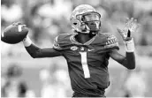  ?? BUTCH DILL/GETTY IMAGES ?? FSU quarterbac­k James Blackman stepped up in the 4th quarter against Miami, throwing for 127 yards and 2 TDs.