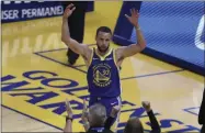  ?? JED JACOBSOHN - THE ASSOCIATED PRESS ?? Golden State Warriors’ Stephen Curry waves to the crowd after scoring against the Oklahoma City Thunder during the first half of an NBA basketball game in San Francisco, Saturday, May 8, 2021.
