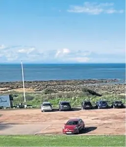  ??  ?? Visitors parked up at Kingsbarns as they make the most of the easing of coronaviru­s restrictio­ns.