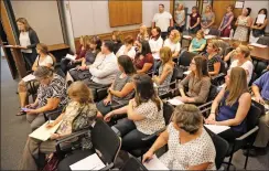  ?? Katharine Lotze/The Signal (See additional photos at signalscv.com) ?? Parents fill the Newhall School Board’s chambers on Tuesday to address the board about the school’s calendar.